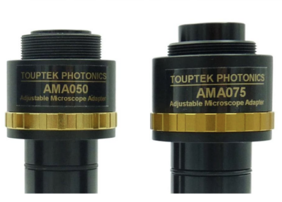 Two black microscope adapters with gold knurled rings, labeled TOUPTEK PHOTONICS AMA050 and AMA075 (Adjustable Microscope Adaptor).